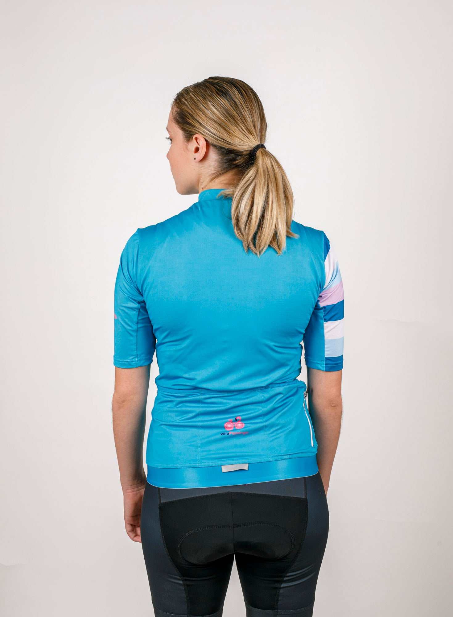 AquaVelo Womens Cycling Jersey - Stylish Womens Specific Fit - back of blue cycling jersey