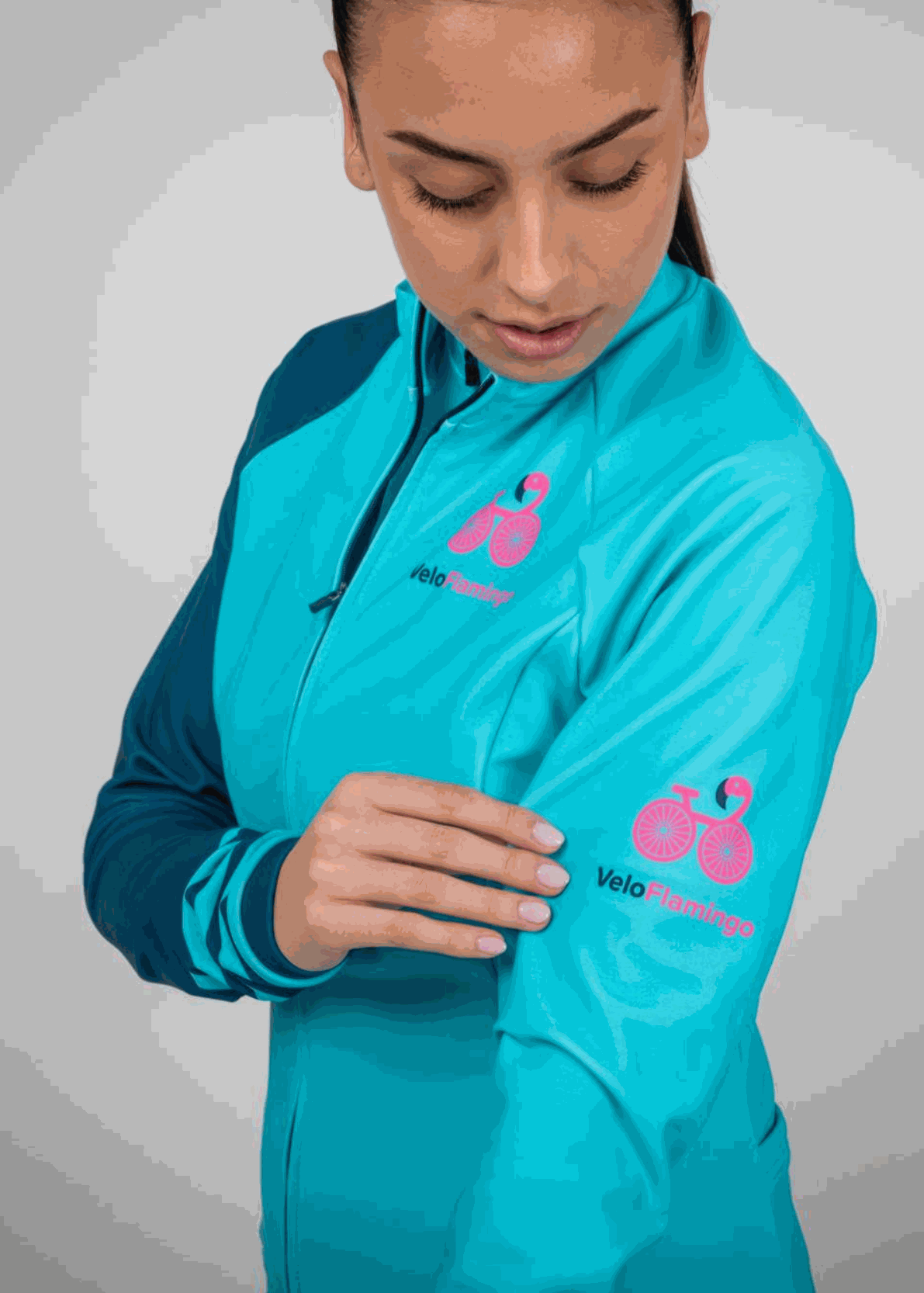 Maria Long Sleeve Jersey - Perfect for Autumn and Winter Cycling - mint green with dark green sleeve and feature stripes on cuff - left hand sleeve with logo